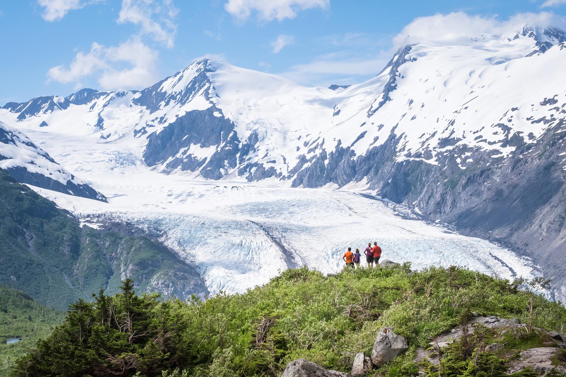 Visit Anchorage photo shoot - couples enjoying view of Portage Glacier